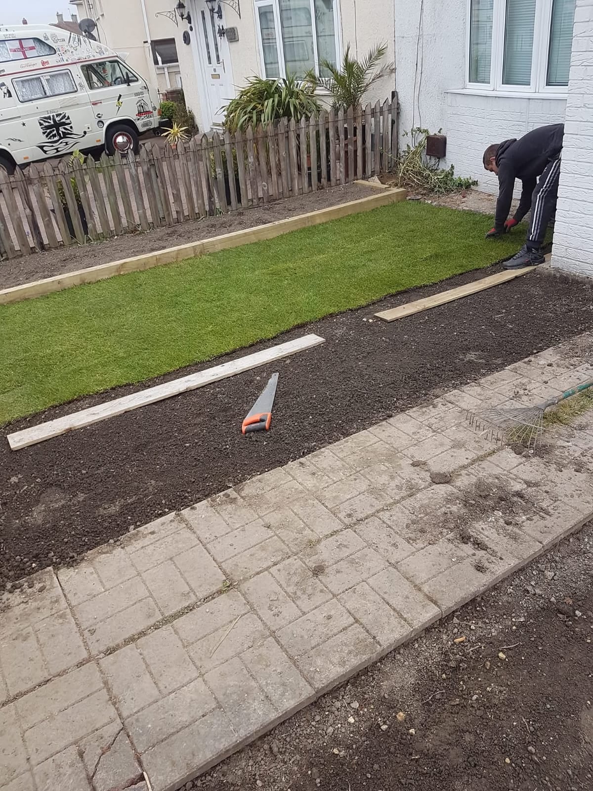 Artificial lawn with path and front garden edging by Ashurst and Sons Roofing