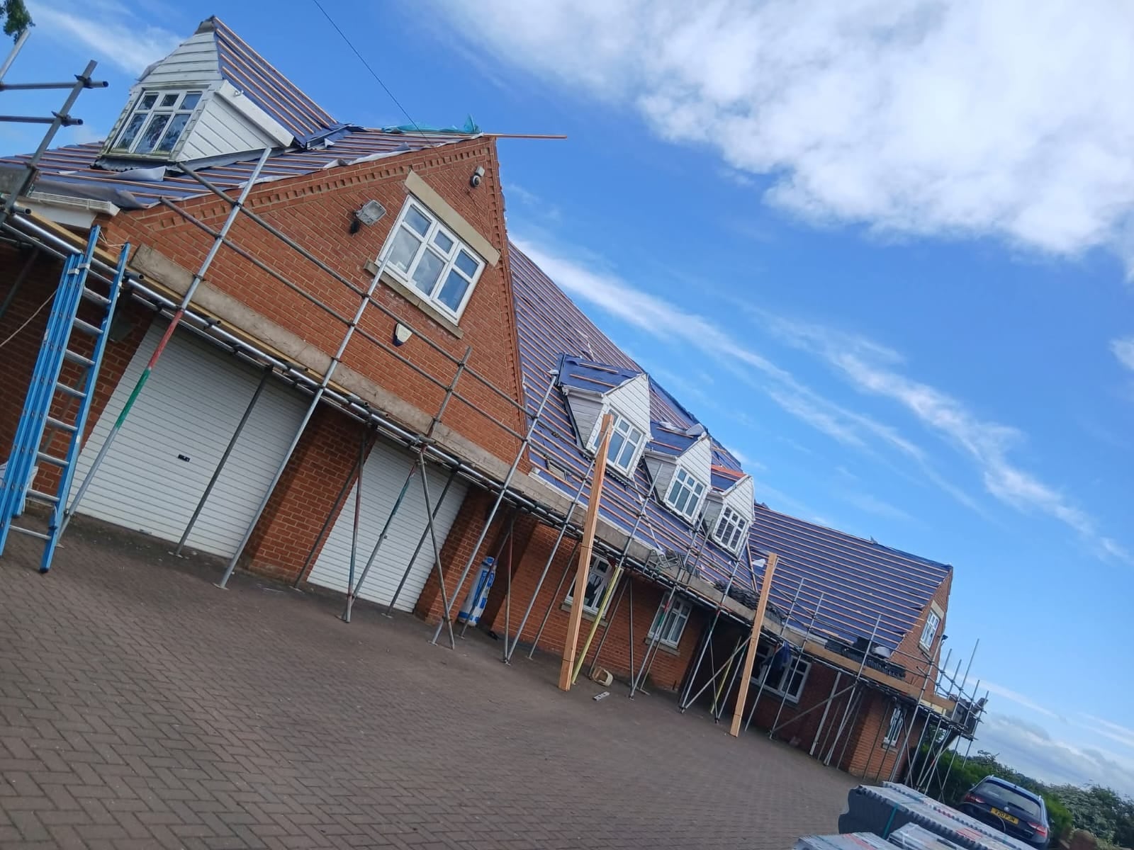 Ashurst and Sons Roofing tiled roof project on scaffold